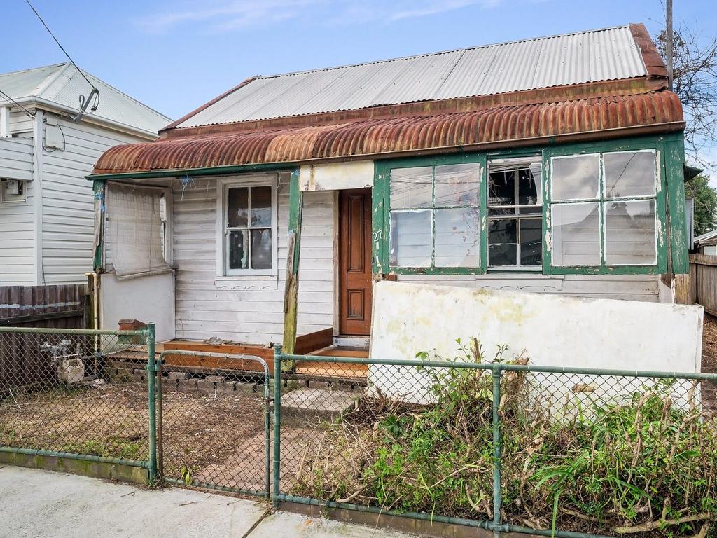 Derelict Sydney home with rotting floors sparks developer frenzy before auction Derelict Sydney home with rotting floors sparks developer frenzy before auction