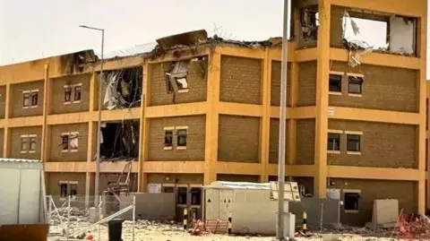 CBS News A building damaged by Iranian strike, Camp Arifjan, Kuwait. Undated.