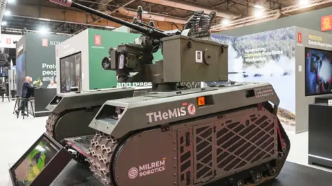 NurPhoto via Getty Images Unmanned ground vehicle built by Milrem Robotics on display at an exhibition in Paris