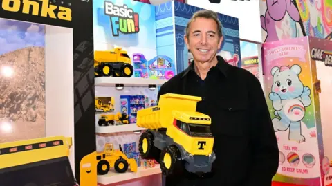 Basic Fun Jay Foreman, chief executive of Florida-based toy company Basic Fun, holds a Tonka truck
