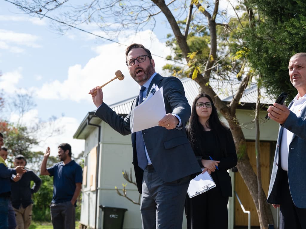 Fire-ravaged Sydney home sparks hot auction Fire-ravaged Sydney home sparks hot auction