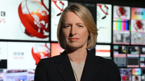 Director of BBC News and Current Affairs Rachel Jupp, pictured in the TV gallery in front of lots of screens