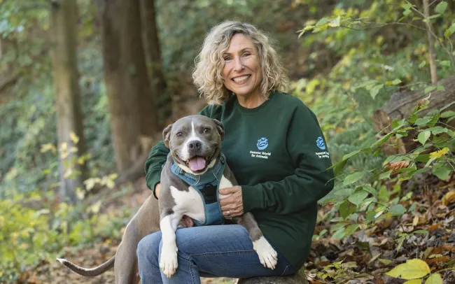 Kitty Block, President and CEO of the Humane World for Animals, poses with Mini